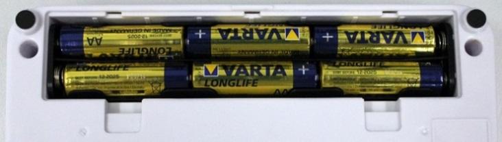 batteries in the battery compartment, close