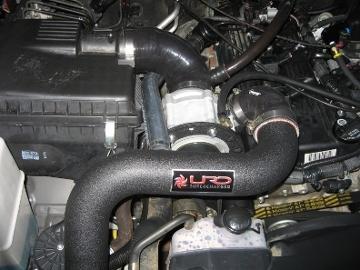 A. Install the supercharger intake elbow to the air filter box and supercharger inlet and secure it with a 3 liner clamp at each end. B.