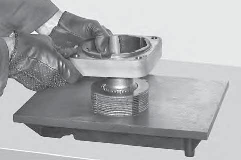 For the assembly, use a plastic hammer and push the piston (12) to end of stroke.