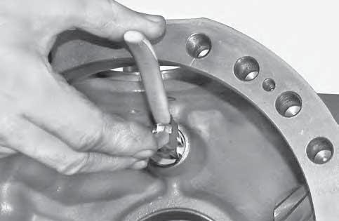 ring (12). FIGURE 24: Install the intermediate cover (13) and lock it with screws (14).