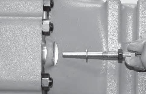 ADJUST ADJUST Tecno Lube 101 FIGURE 4: Remove screws complete with nuts and seals.