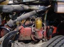 Disconnect the fuel lines and remove the primary fuel filter. FIGURE 5 FIGURE 6 5-2.