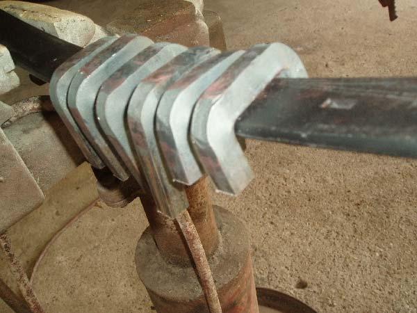 I attached a 2 piece of 1 ½ X 1 ½ angle iron to the side and even with one end of the square tubing.