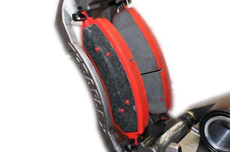 9. Install the brake pads into the caliper by