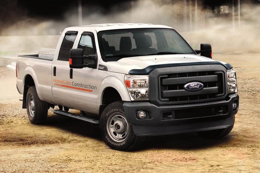 F-250 XL Crew Cab in Oxford White accessorized with 5" black step bars, fog lamps, smoked hood and