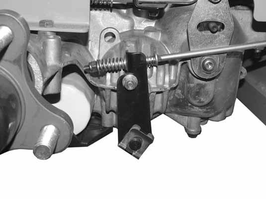 Screw Filter guard Figure 4-12 9. IMPORTANT: Remove the top port plug from both transaxles prior to filling with oil. This will allow the transaxles to vent during oil fill. Figure 4-13 10.
