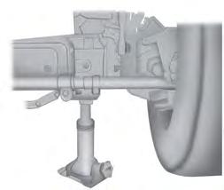 F-250 and F-350 Single Rear Wheel Vehicles E162801 1. Insert the hooked end of the jack handle into the jack and use the handle to slide the jack under the vehicle. 2.