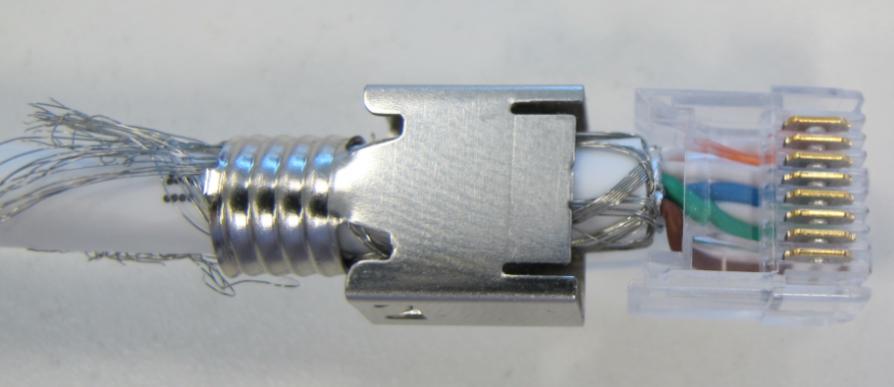 114-93038 7. Push the wire holder into the housing until it latches into both sides of the plug housing.