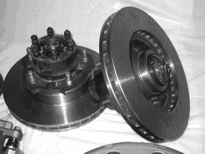 4 Cause of Rear Brake Problems 1 Combining a drum handbrake and a disc rotor and caliper within the confines of a 16-inch wheel necessitates a small brake caliper and small pad radial section,