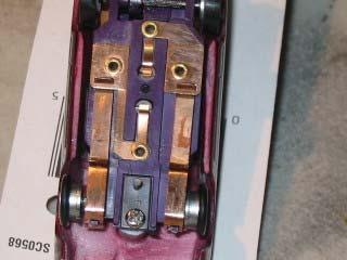 Picture from the bottom side of the chassis. Side view, new orings mounted are.366" and they touch and roll on the track.