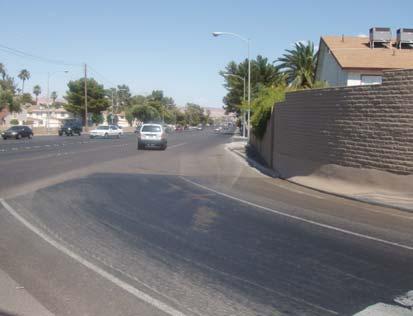 Priority 1: To address the pedestrian issue at the bus stop across the Don Bonito Street at US 95 northbound off ramp, the RSA team recommends a