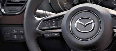 www.mazdausa.com VOICE CONTROL Voice control is activated by pushing the TALK button on the steering wheel and speaking a command.
