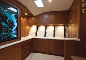 while the optional anglers room layout features a display cabinet, custom rod racks, ample work