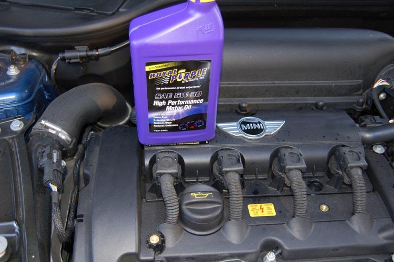 11. Fill the engine with 5 quarts of synthetic motor oil and replace the oil fill cap.