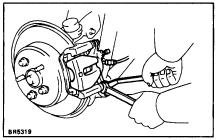 LIFT UP CALIPER (a) Hold the sliding pin on the bottom and loosen the installation bolt. (b) Remove the installation bolt. (c) Lift up the caliper and suspend it securely.