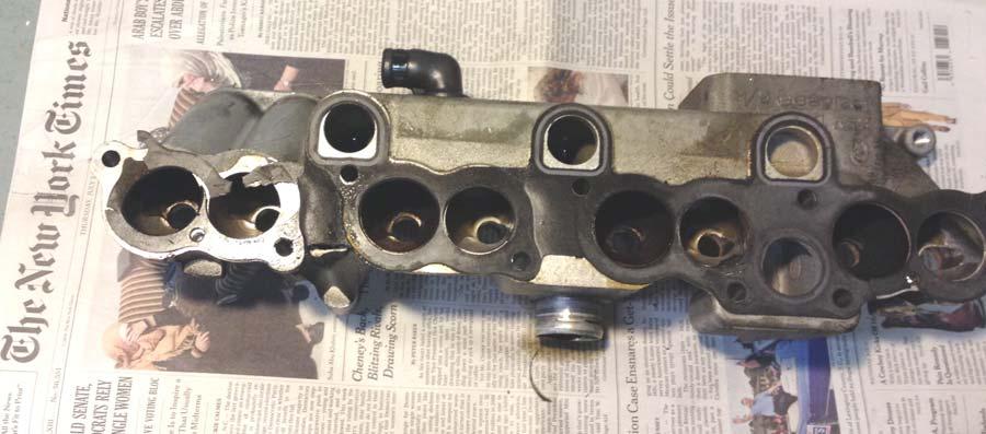 The injector housing and plenum gaskets were revised with different material to address a shrinkage problem.
