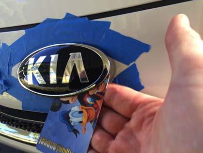 STEP 4: Once you get to the K in Kia you will hit one of the plastic post that help guide the badge into proper position.