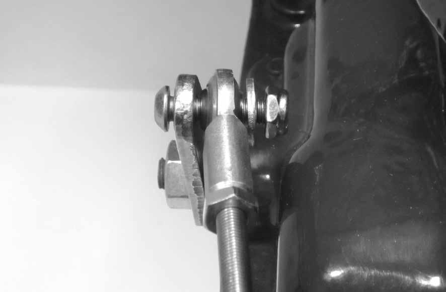 11 Step 15: Check the adjustment of the shifter linkage by placing the shifter lever all the way forward into the Park position. Make sure that the release button still moves up and down freely.