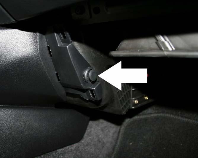 7. Removal of the panel in the previous step exposes a push clip on the passenger