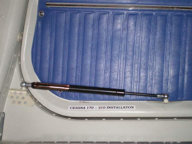 SECTION A, Page 3 of 6 Picture 1. (Note the airframe attach point is slightly higher than the door attach point.) 7.