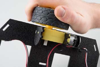Make sure that the rounded edges of the motor mounts and the wires are facing toward the center of the chassis.