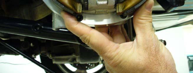 up. Figure 2 shows the installation of the parking brake shoe for the