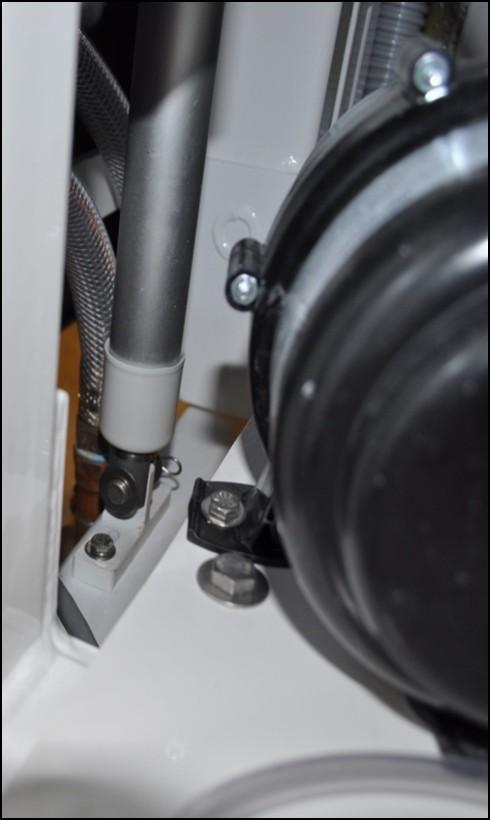 CHECK ACTUATOR MOUNT - RR7II 1) Ensure tub is in the highest position. 2) Ensure the actuator mount under the tub is securely fastened. 3) If it is not, (2) 9/16" wrenches to tighten.