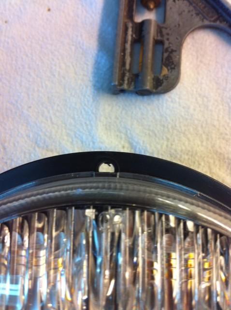 2. Locate the center of the top of the LED light. TOP is labeled on the lens of the light. 3.