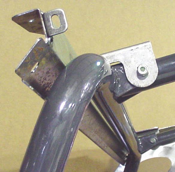 1 With assistance, install the rear mount as shown in figure 3.1. Use the two original equipment M10 bolts found in the rear overhead ROPS tubing.