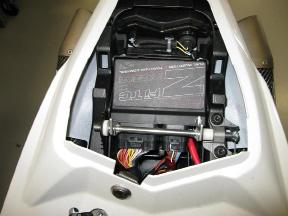 WE STRONGLY SUGGEST THAT AN EXPERIENCED TECHNICIAN INSTALL THIS BAZZAZ PRODUCT 1. Begin the installation by removing the seats, fuel tank, air box and lower fairing. 2.