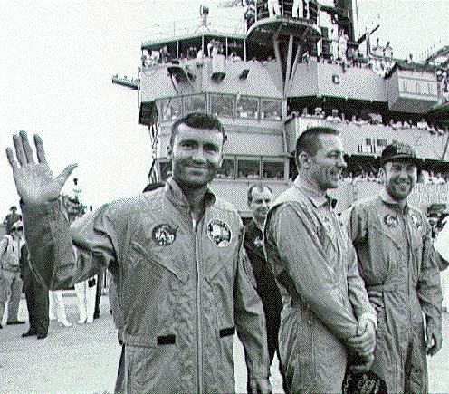 01:53 PM T+143:40 crew arrives aboard USS Iwo Jima in Helicopter 66.