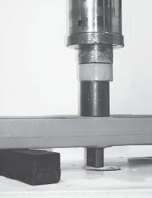 Mark the clocking position of the D-pin bushing on the support beam with a paint stick, see Figure 8-15. 10. Install the D-Pin Removal Tool centered on the D-Pin bushing, see Figure 8-16.