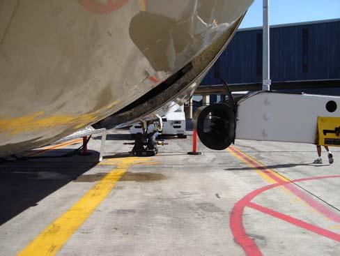 POSITIONING AWAY FROM AIRCRAFT STEP 1: Operator completes walk around to ensure belt loader is clear to