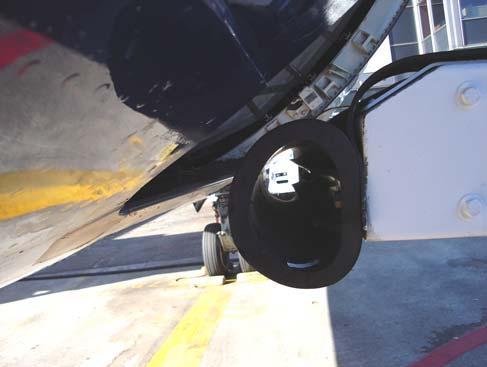 NOTE: At least a 2inch gap should be maintained between the rubber bumper of the belt loader and the aircraft at all times.