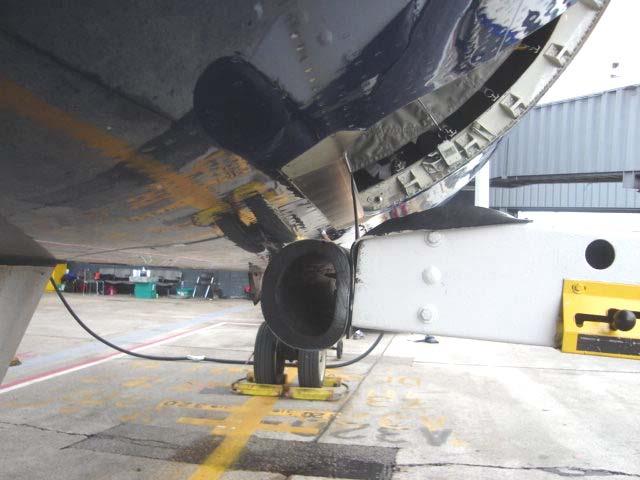 PLACE ANY PORTION OF THE BELT LOADER UNDER THE AIRCRAFT As fuel and passengers are added to the