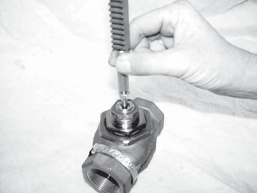 The linkage components have been designed to attach to the valve in this state, rather than to any existing hardware.
