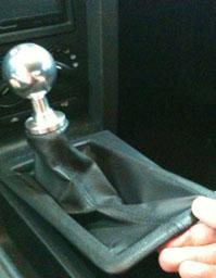 2. Remove the Shifter boot (Manual) or Shifter Handle (Auto).