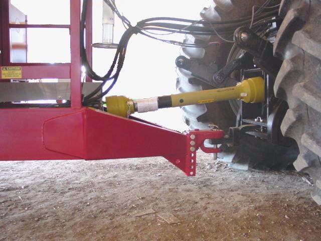 Attach the driveline to the tractor by retracting the locking pin, slide the yoke over the shaft and push on the yoke until the lock pin clicks into position.