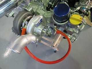 34 Use the zip tie (9)Attach the supplied heat shield of exhaust housing Attach the heat shield