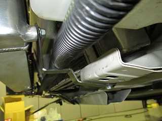 Carefully position the intercooler so as to be centered, and parallel with the A/C condenser, then the intercooler