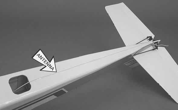Tape the antennas to the side of the fuselage in the orientation described in your radio manual.