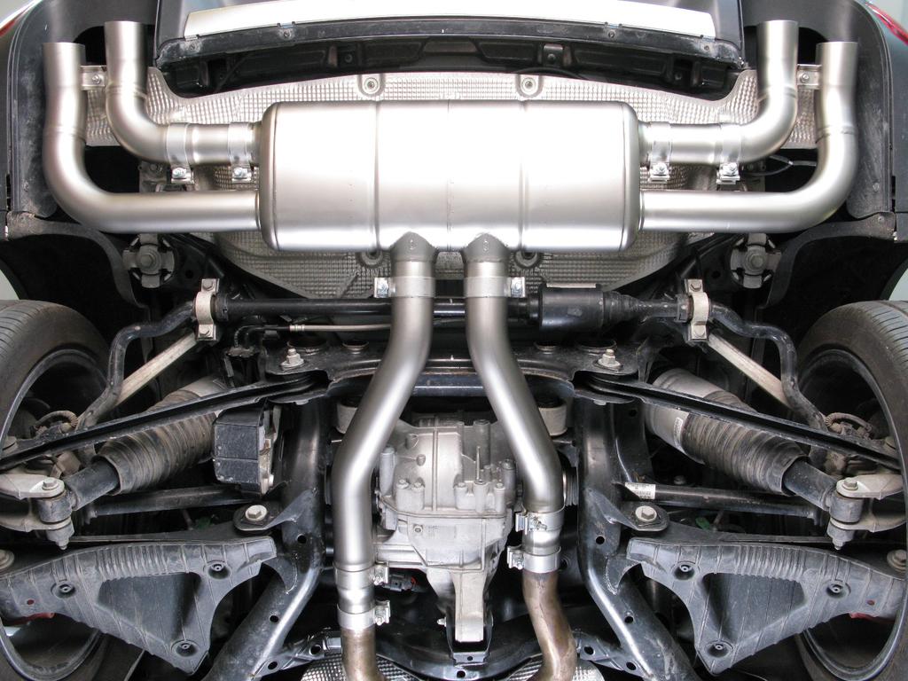 6. For Turbo, Turbo S, S, V6 and Hybrid models only: slide the muffler onto the