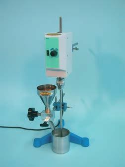 The sample is heated at 165 C and ambient temperature air is blowed into the flask containing the binder hardening the same.