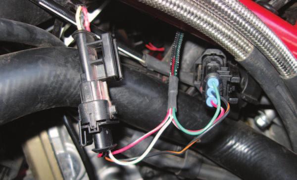 F 9 the stock wiring harness from the Throttle Position Sensor (Fig. F).