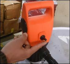 the pump by screwing the holder into the pump body.