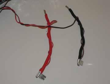 7. Strip the Red & Black lead wires ¼ from the cut end. See Figure 7. 8.