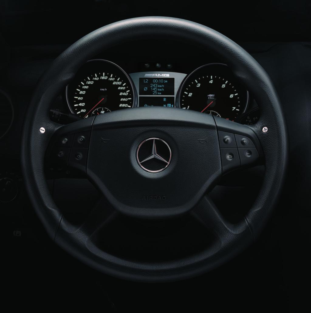 2 gearshift buttons on the AMG ergonomic sports steering wheel and the AMG instrument cluster with specially