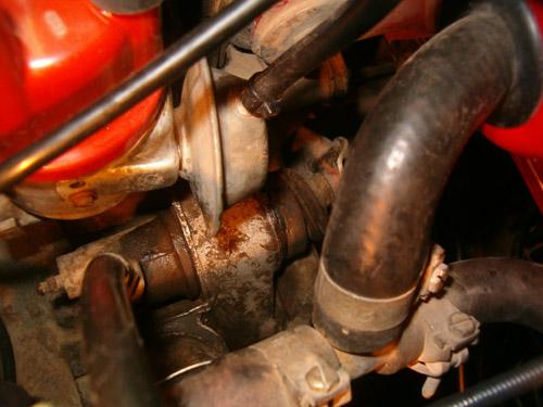 You will need to remove the leads of cylinder 2-4 plus the HT lead from the coil, the oil filler neck/vapor separator in order to have enough clearance to reach the