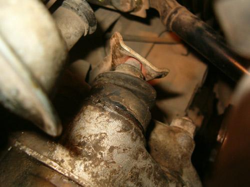 The rubber boot of the cylinder seems to be shot from the presence of brake fluid.