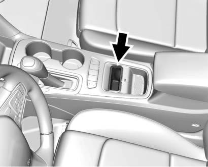 Instruments and Controls 111 Wireless Charger (Vehicle with Fixed Armrest shown) To charge a mobile device: 1. Remove all objects from the charging pocket.